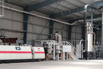 Recycled PET for India’s first 100 % rPET beverage bottle produced by Srichakra Polyplast on Starlinger equipment 